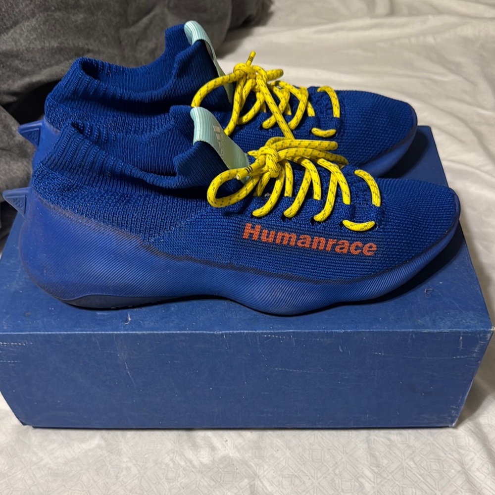 Blue Humanrace Sneakers with Yellow Laces